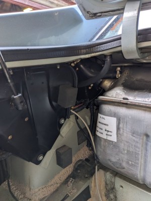 Tank Filler behind hockey stick.jpg