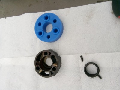 Original coupling damper & new doughnut replacement.jpg
