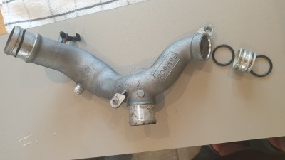 Pipe - Coolant outlet to top hoses.jpg